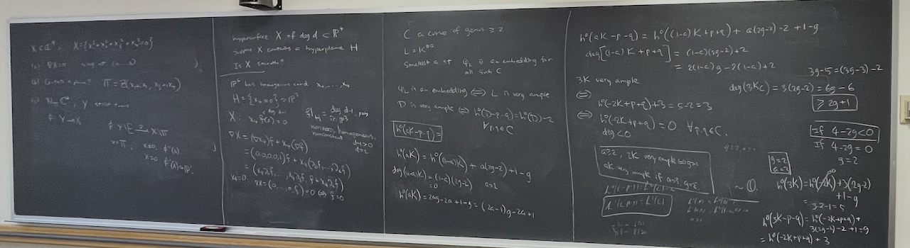 Example oral exam boardwork on a classroom chalkboard